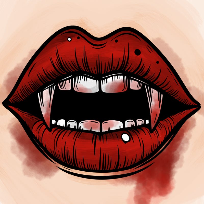 lips with vampire teeth