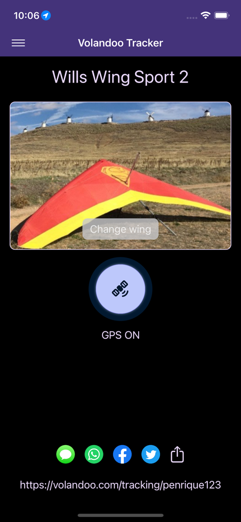 Volandoo Tracker - Volandoo Tracker app interface showing a Wills Wing Sport 2 hang glider with GPS enabled and social sharing links