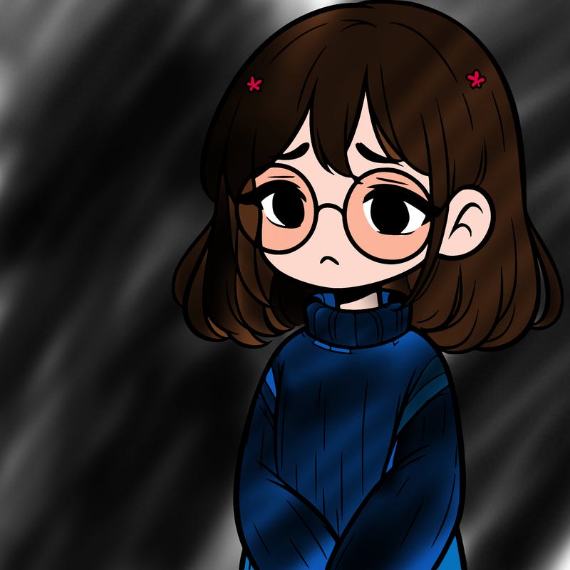 sad girl with glasses in a sweater