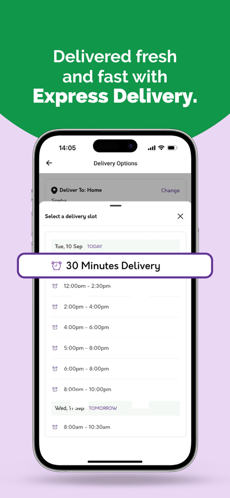 FreshToHome app interface showing 30 minute express delivery and scheduled time slot selection on a mobile phone