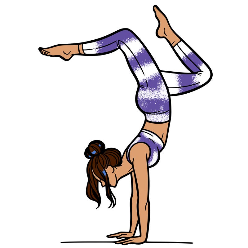 a woman doing a handstand