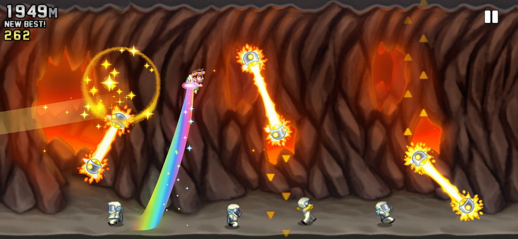 Barry Steakfries che usa un jetpack arcobaleno per volare attraverso una caverna con dei laser in Jetpack Joyride.