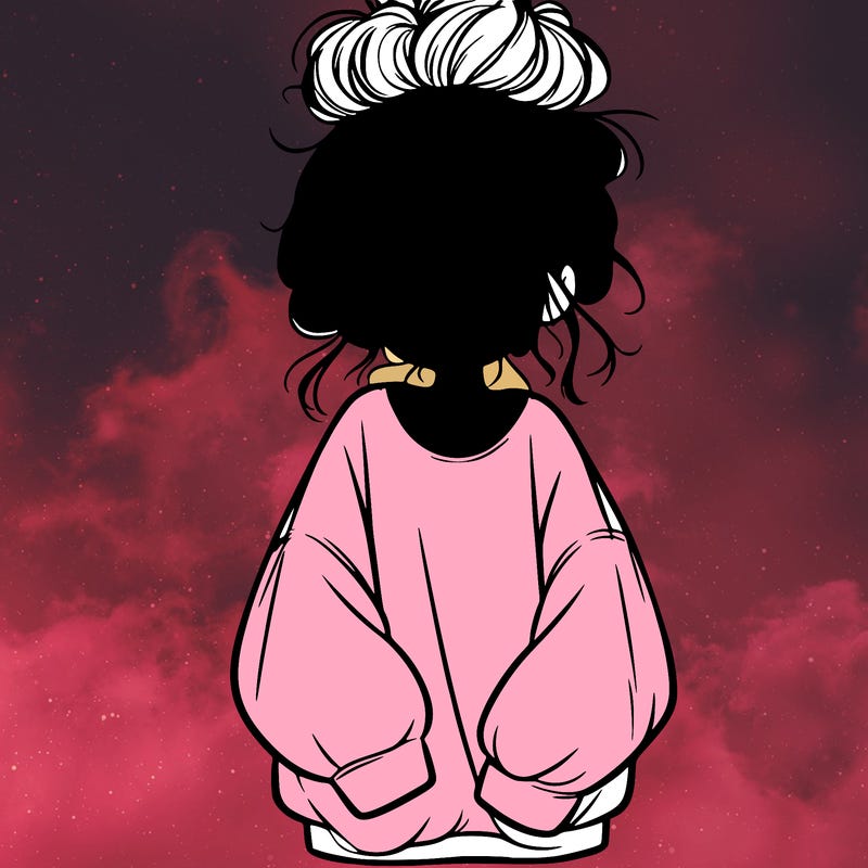 girl with baggy sweatshirt and messy bun