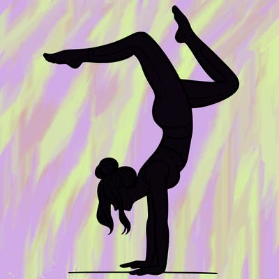 a woman doing a handstand