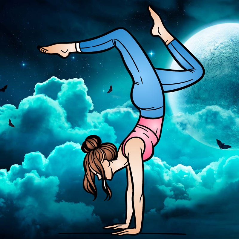 a woman doing a handstand