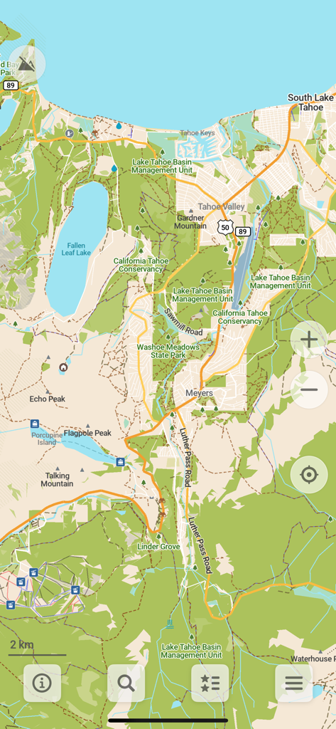 Detailed topographic map of the South Lake Tahoe area in the CoMaps app showing hiking trails and peaks.