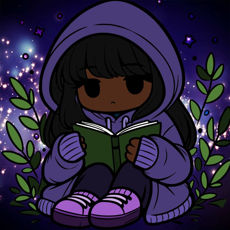 girl in oversized hoodie reading a book
