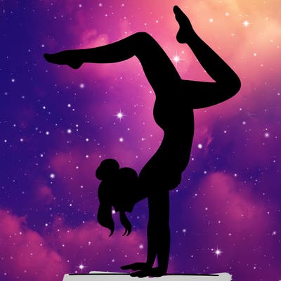 a woman doing a handstand