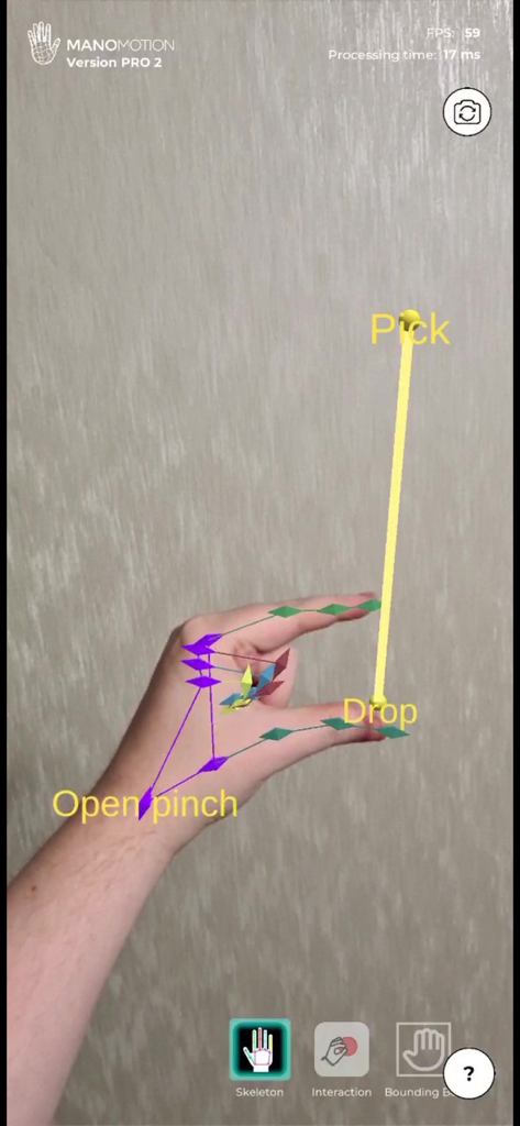 ManoMotion Tech Pro - Augmented reality hand tracking demonstrating a pinch gesture with skeletal joint overlays