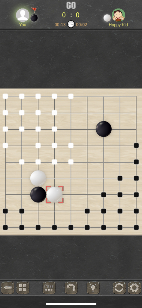 Go Game - 2 Players - Uma partida de Go sendo jogada em um tabuleiro de madeira 9x9 no aplicativo Go Game 2 Jogadores