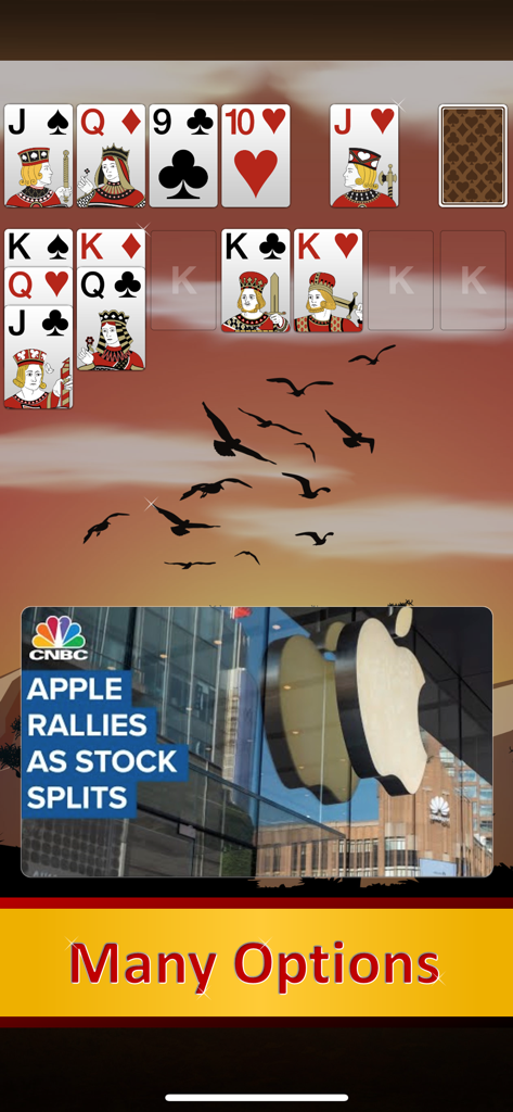 Solebon Solitaire - 50 Games - Classic solitaire gameplay in Solebon Solitaire featuring a sunset background and customizable card styles