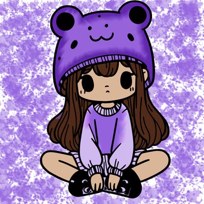 a girl wearing a frog hat and some frog socks