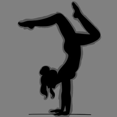 a woman doing a handstand