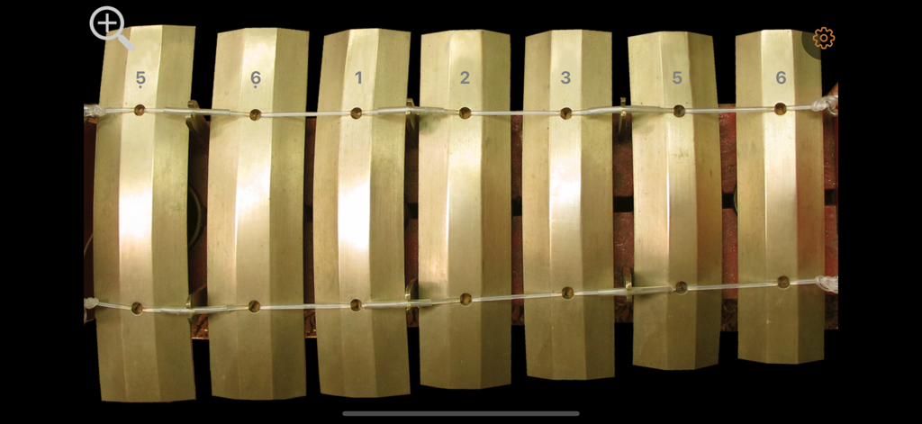 Penyacah - Top down view of the Penyacah metallophone keys with cipher notation in the app interface