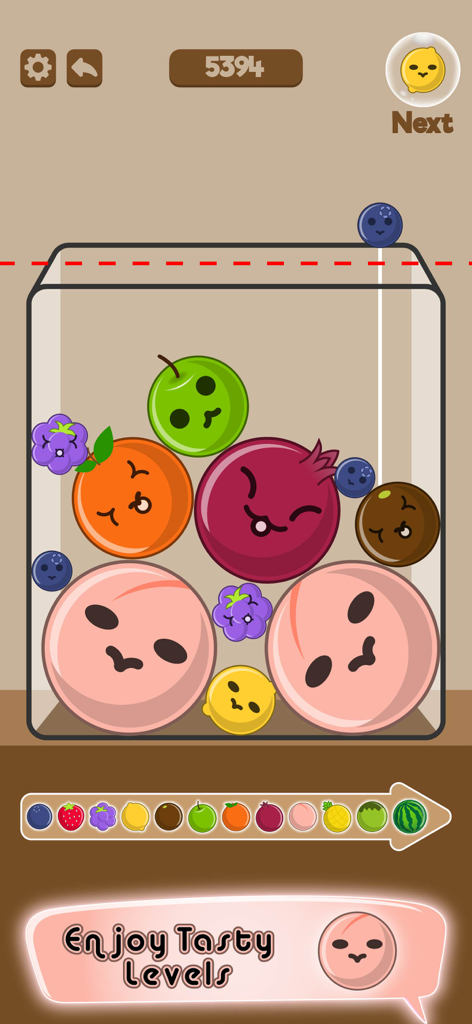 Merge Watermelon & Fruit Game - A screenshot of the Merge Watermelon and Fruit Game gameplay showing various colorful fruits with cute faces in a container