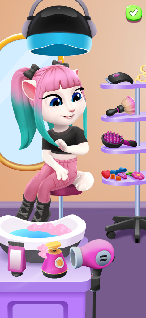 Talking Angela sitting in a beauty salon chair with colorful pink and blue hair surrounded by styling tools