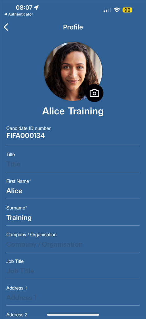 User profile screen in the FIFA Football Agent Exam app showing candidate ID and personal information fields