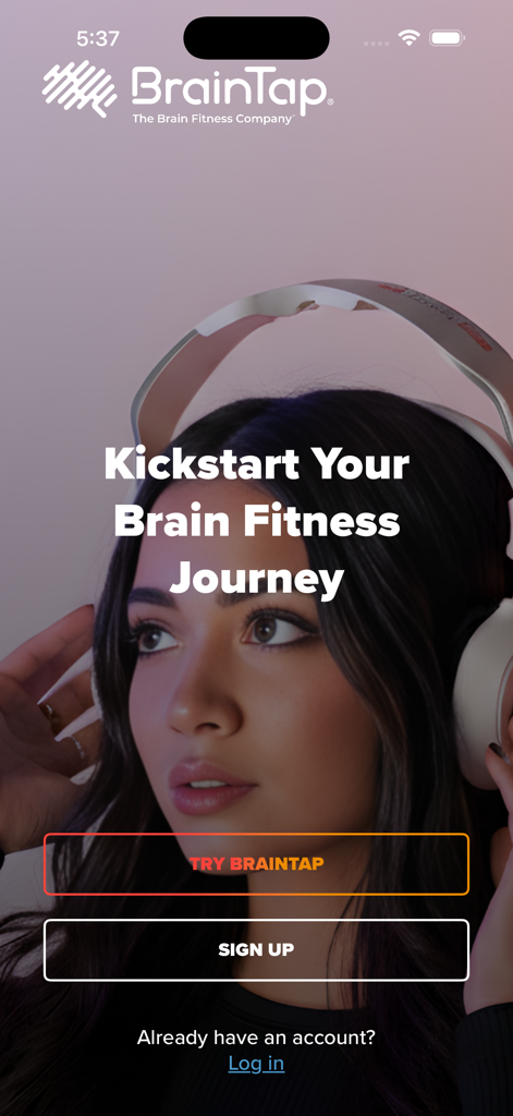 BrainTap app welcome screen featuring a woman wearing headphones and the message Kickstart Your Brain Fitness Journey