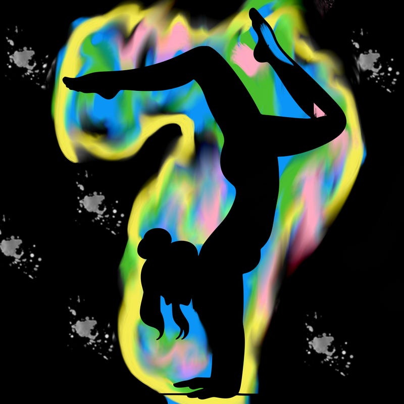 a woman doing a handstand