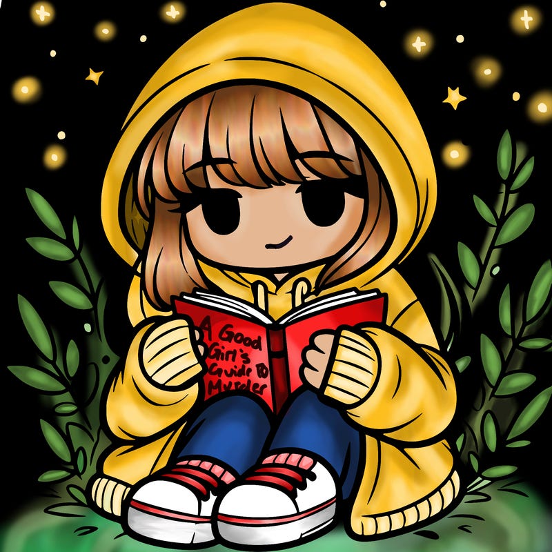 girl in oversized hoodie reading a book