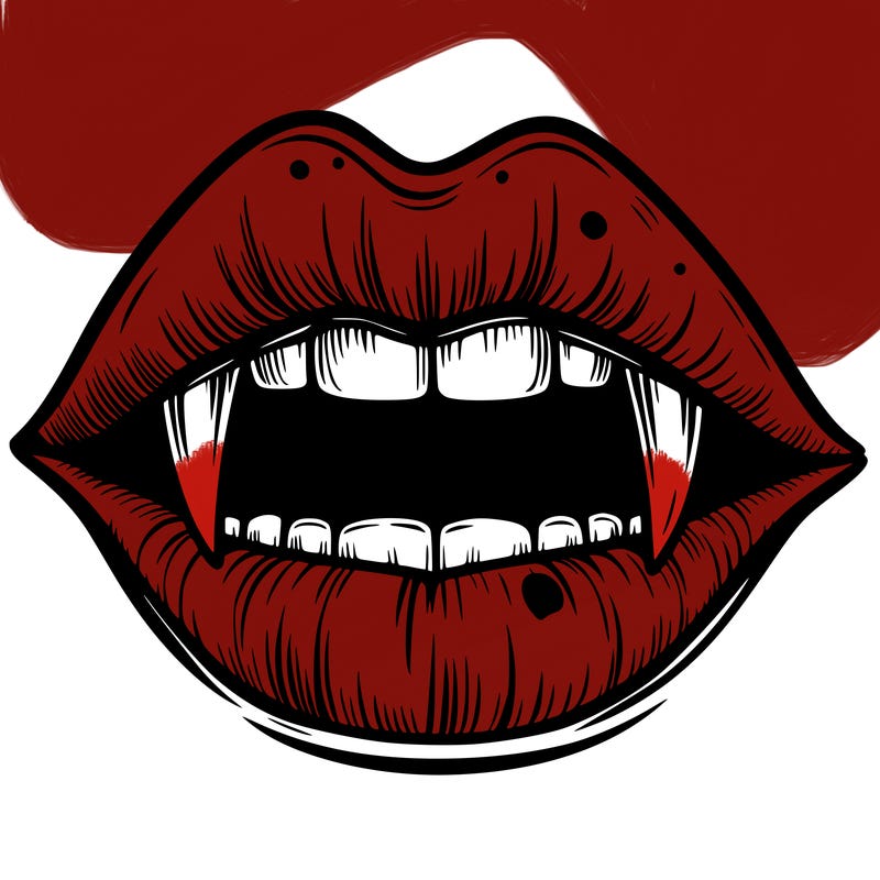 lips with vampire teeth