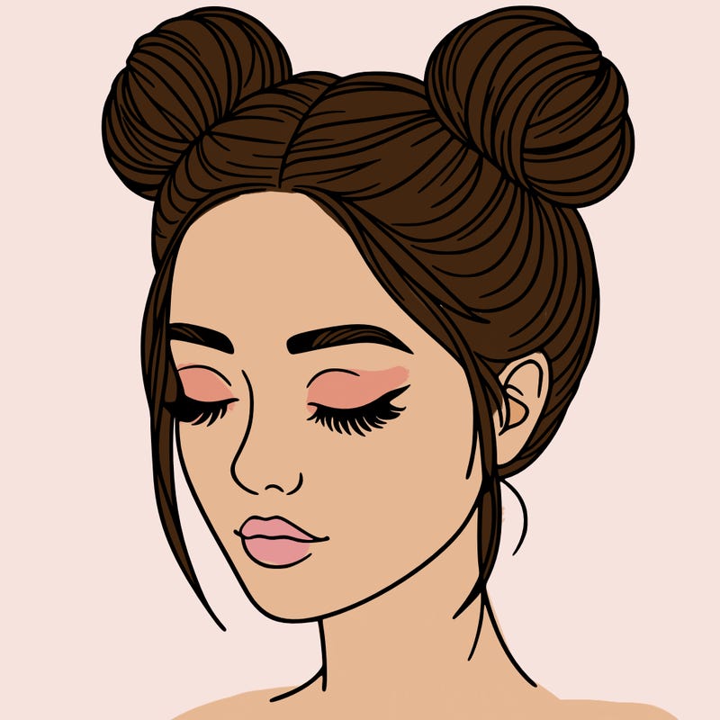 woman with hair buns