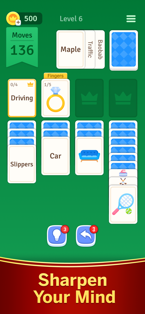 Gameplay screen of Solitaire Associations Journey showing word cards being sorted into categories like driving and fingers on a green background