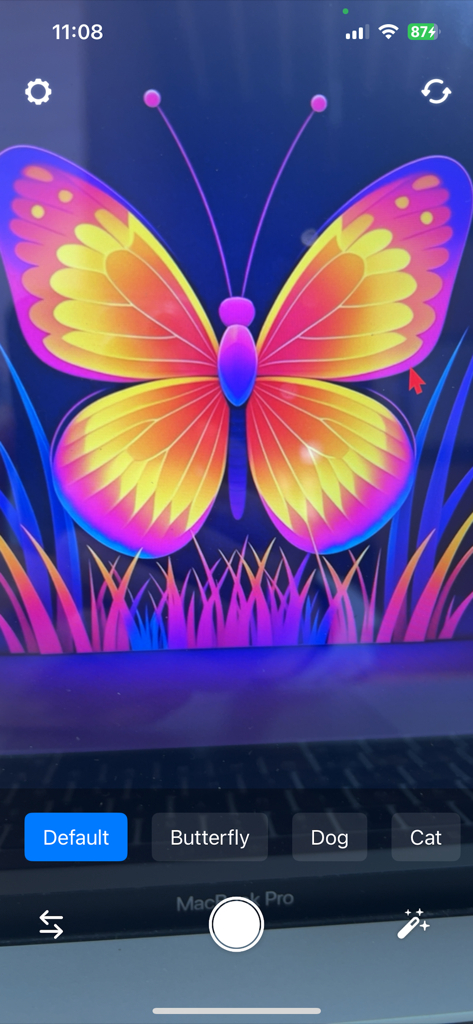 EyeShift app real-time camera view showing a colorful butterfly and animal vision filter selection for Butterfly Dog and Cat