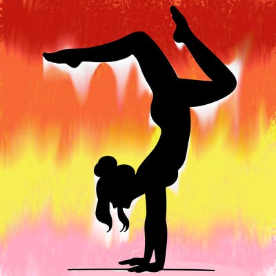 a woman doing a handstand