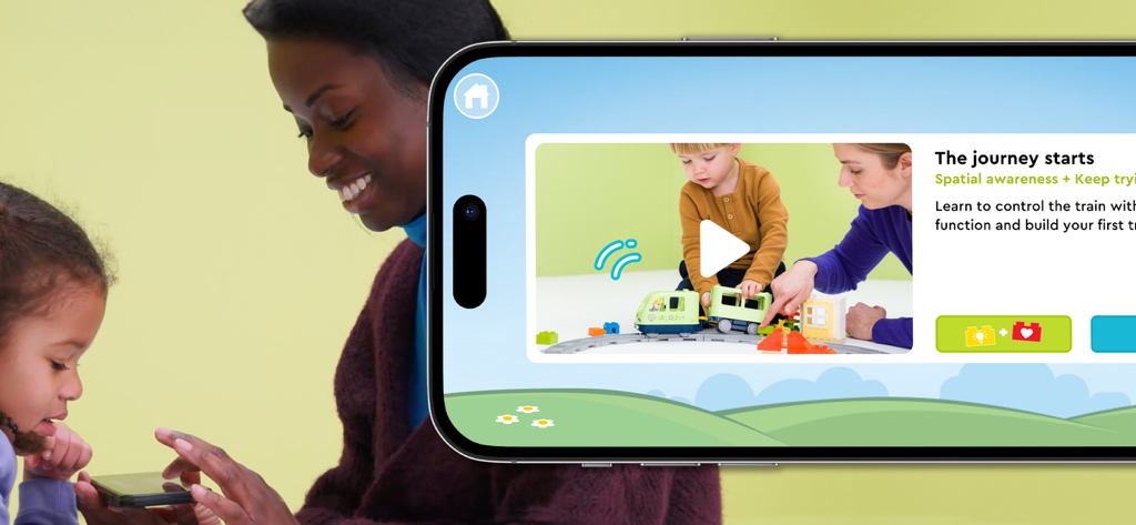 LEGO® DUPLO® Trains - Mother and toddler using the LEGO DUPLO Trains app for developmental play and spatial awareness