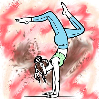 a woman doing a handstand