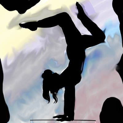 a woman doing a handstand