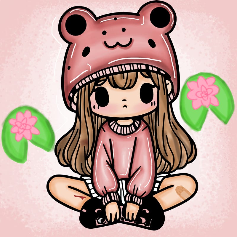 a girl wearing a frog hat and some frog socks