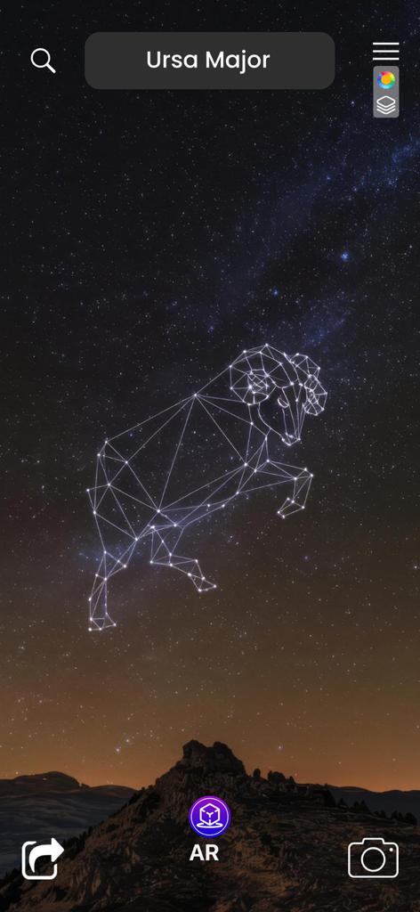 Augmented reality view of a constellation overlaid on a starry night sky above a mountain range