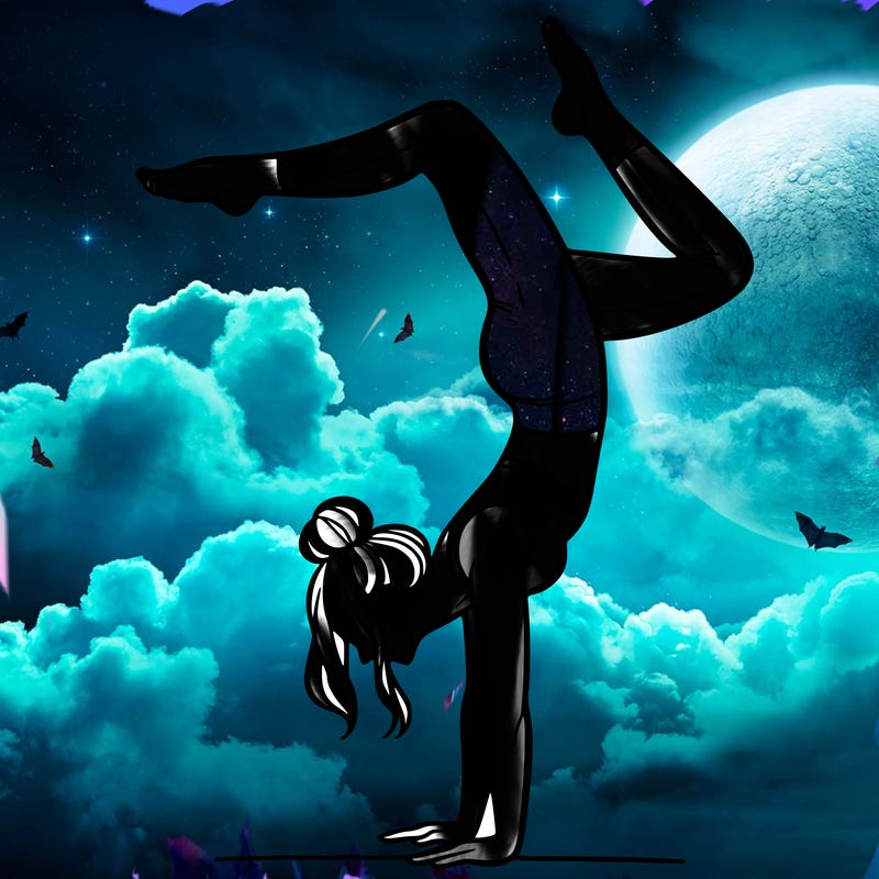 a woman doing a handstand