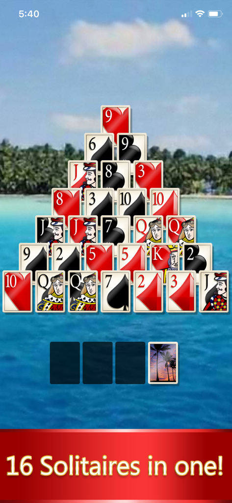 Solitaire: Deluxe® Classic - Pyramid Solitaire game screen with large EasyRead cards and a tropical beach background