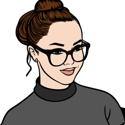 woman with her hair in a bun, and glasses and chubby