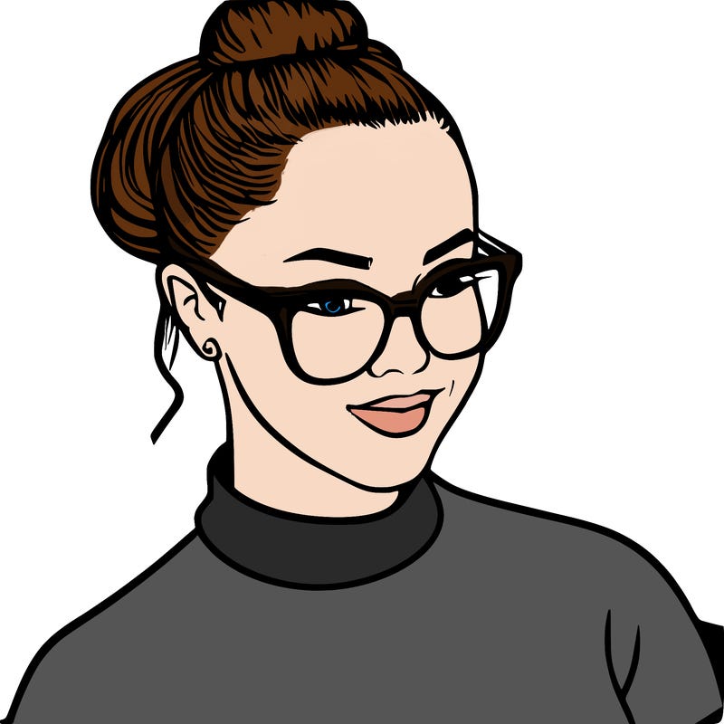 woman with her hair in a bun, and glasses and chubby