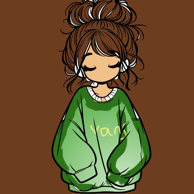 girl with baggy sweatshirt and messy bun