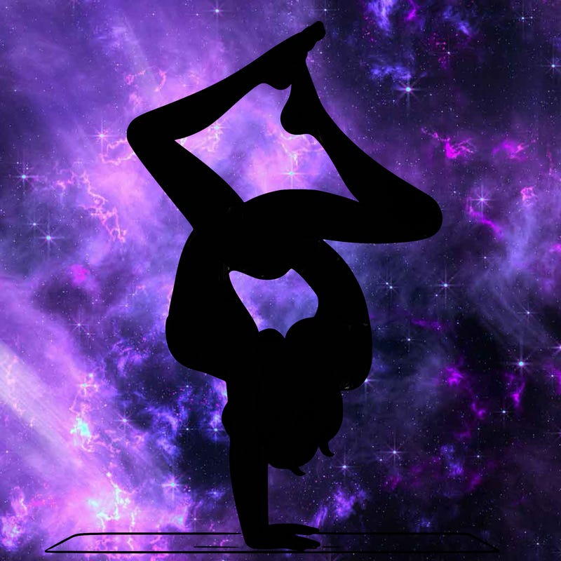 a woman doing a handstand