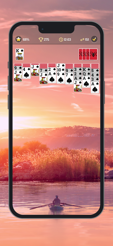 Interfaz de juego de Spider Solitaire con fuentes grandes y un sereno fondo de lago al atardecer.