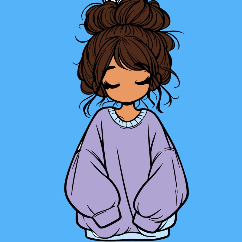 girl with baggy sweatshirt and messy bun