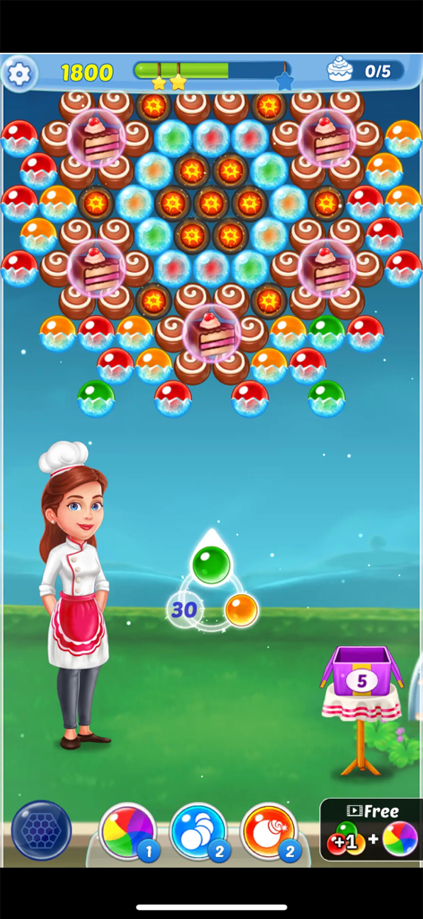 A gameplay screenshot of Bubble Shooter Pastry Pop featuring the chef character Kate and colorful dessert themed bubbles.