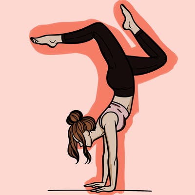 a woman doing a handstand