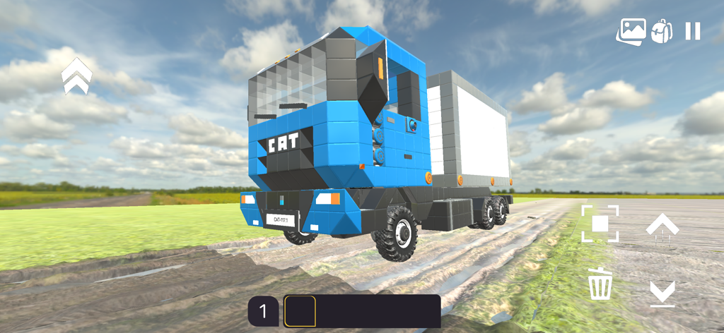 A custom built blue truck driving in the Evertech Sandbox open world.