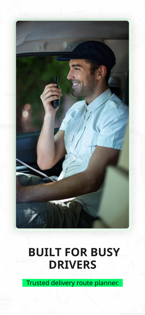 Geo2 Delivery Route Planner - A smiling delivery driver using a communication device inside his vehicle