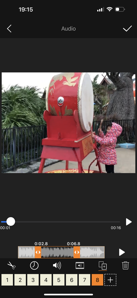 Videdit - Handy Video Editor - Mobile app interface of Videdit showing audio waveform editing and trimming tools for a video of a child playing a drum