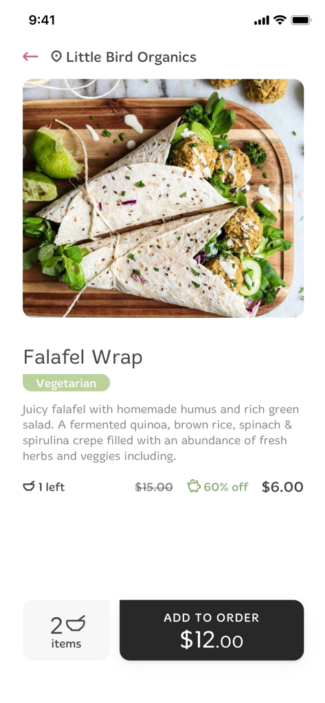Foodprint - Una página de artículo de Wrap de Falafel en la aplicación Foodprint que muestra un descuento del sesenta por ciento en Little Bird Organics.