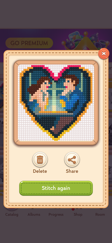 Craft Cross Stitch: Pixel Art - A completed pixel art cross-stitch pattern of a couple on a date inside a heart-shaped frame