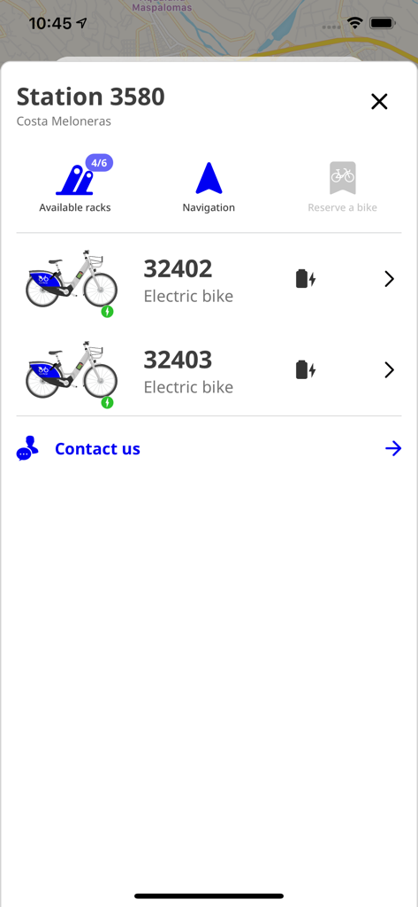 Lovesharing bikes app showing electric bike availability at a station in Costa Meloneras